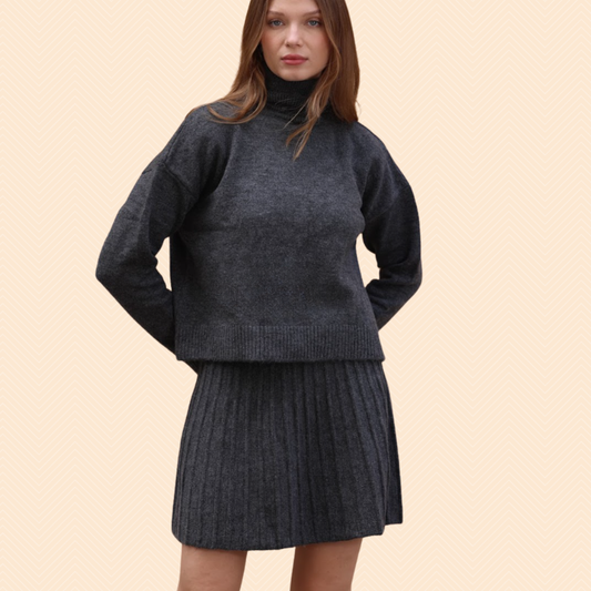 Pleated short skirt and turtleneck sweater